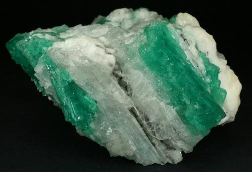 Beryl (variety emerald), Calcite<br />Coscuez mining district, Municipio San Pablo de Borbur, Western Emerald Belt, Boyacá Department, Colombia<br />105x80x60mm<br /> (Author: Fiebre Verde)