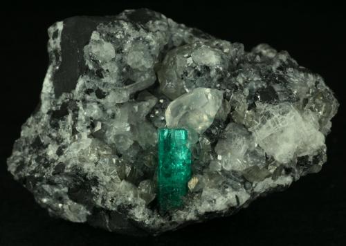 Beryl (variety emerald), Calcite<br />La Pita mining district, Municipio Maripí, Western Emerald Belt, Boyacá Department, Colombia<br />46x42x34mm<br /> (Author: Fiebre Verde)