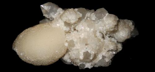 Quartz with calcite and calcite egg<br />Cavnic mining area, Cavnic, Maramures, Romania<br />~ 10.5 cm<br /> (Author: Deyu)