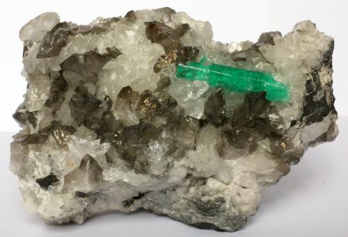 Beryl (variety emerald), Calcite, Quartz<br />Coscuez (distrito minero), Municipio San Pablo de Borbur, Cinturón Esmeraldífero Occidental, Departamento Boyacá, Colombia<br />75x60x40mm<br /> (Author: Fiebre Verde)