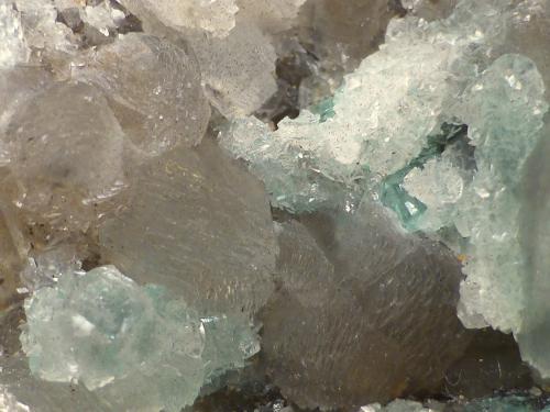 Beryl (variety emerald), Calcite<br />Coscuez mining district, Municipio San Pablo de Borbur, Western Emerald Belt, Boyacá Department, Colombia<br />85x80x60mm - FOV=8mm<br /> (Author: Fiebre Verde)