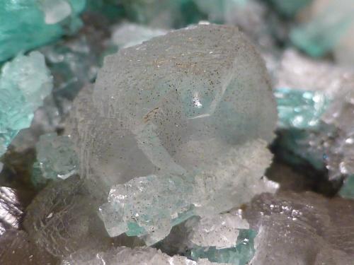 Beryl (variety emerald), Calcite<br />Coscuez mining district, Municipio San Pablo de Borbur, Western Emerald Belt, Boyacá Department, Colombia<br />85x80x60mm - FOV=4mm<br /> (Author: Fiebre Verde)