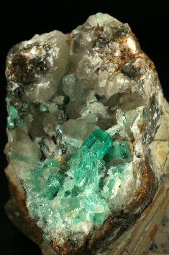 Beryl (variety emerald), Calcite<br />Coscuez mining district, Municipio San Pablo de Borbur, Western Emerald Belt, Boyacá Department, Colombia<br />85x80x60mm - Detail<br /> (Author: Fiebre Verde)