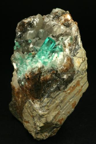 Beryl (variety emerald), Calcite<br />Coscuez mining district, Municipio San Pablo de Borbur, Western Emerald Belt, Boyacá Department, Colombia<br />85x80x60mm<br /> (Author: Fiebre Verde)