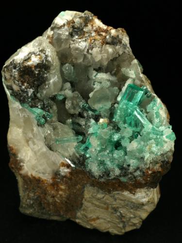 Beryl (variety emerald), Calcite<br />Coscuez mining district, Municipio San Pablo de Borbur, Western Emerald Belt, Boyacá Department, Colombia<br />85x80x60mm<br /> (Author: Fiebre Verde)