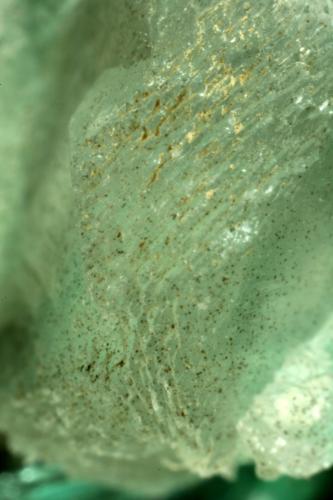 Beryl (variety emerald), Calcite<br />Coscuez mining district, Municipio San Pablo de Borbur, Western Emerald Belt, Boyacá Department, Colombia<br />85x80x60mm - FOV=4mm<br /> (Author: Fiebre Verde)
