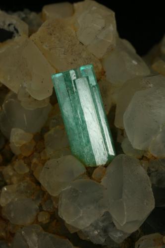 Beryl (variety emerald), Calcite<br />La Pita mining district, Polveros Mine, Municipio Maripí, Western Emerald Belt, Boyacá Department, Colombia<br />Detail - FOV=3.5cm<br /> (Author: Fiebre Verde)