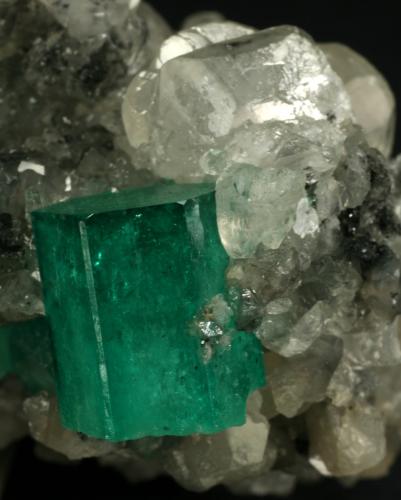 Beryl (variety emerald), Calcite<br />La Pita mining district, Cunas Mine, Municipio Maripí, Western Emerald Belt, Boyacá Department, Colombia<br />60x50x35mm<br /> (Author: Fiebre Verde)