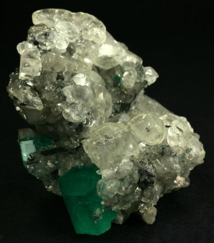 Beryl (variety emerald), Calcite<br />La Pita mining district, Cunas Mine, Municipio Maripí, Western Emerald Belt, Boyacá Department, Colombia<br />60x50x35mm<br /> (Author: Fiebre Verde)