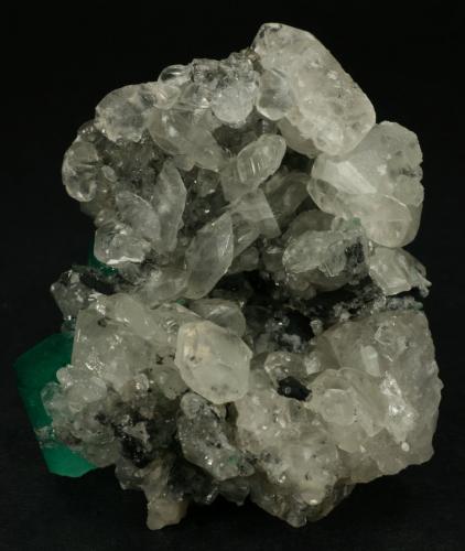 Beryl (variety emerald), Calcite<br />La Pita mining district, Cunas Mine, Municipio Maripí, Western Emerald Belt, Boyacá Department, Colombia<br />60x50x35mm<br /> (Author: Fiebre Verde)