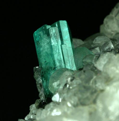 Beryl (variety emerald), Calcite<br />La Pita mining district, Polveros Mine, Municipio Maripí, Western Emerald Belt, Boyacá Department, Colombia<br />80x55x80mm<br /> (Author: Fiebre Verde)