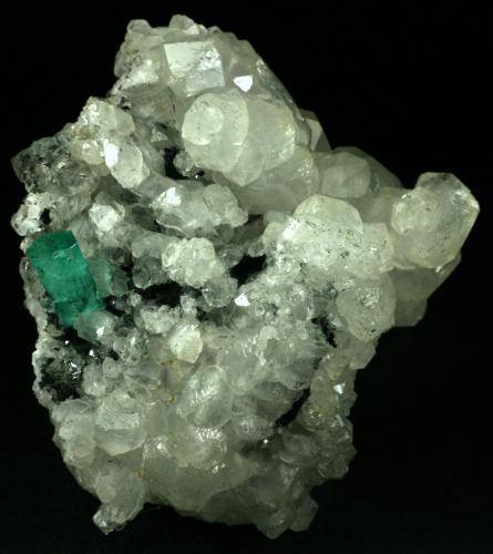 Beryl (variety emerald), Calcite<br />La Pita mining district, Polveros Mine, Municipio Maripí, Western Emerald Belt, Boyacá Department, Colombia<br />80x55x80mm<br /> (Author: Fiebre Verde)