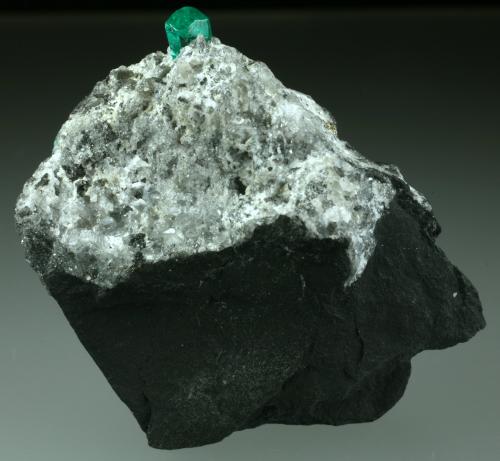 Beryl (variety emerald), Calcite, Pyrite, Quartz<br />Coscuez mining district, Municipio San Pablo de Borbur, Western Emerald Belt, Boyacá Department, Colombia<br />50x20x45mm<br /> (Author: Fiebre Verde)