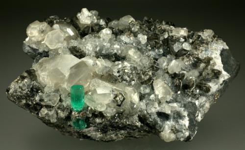 Beryl (variety emerald), Calcite, Pyrite<br />La Pita mining district, Cunas Mine, Municipio Maripí, Western Emerald Belt, Boyacá Department, Colombia<br />100x60x40mm<br /> (Author: Fiebre Verde)