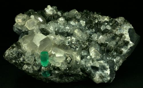 Beryl (variety emerald), Calcite, Pyrite<br />La Pita mining district, Cunas Mine, Municipio Maripí, Western Emerald Belt, Boyacá Department, Colombia<br />100x60x40mm<br /> (Author: Fiebre Verde)