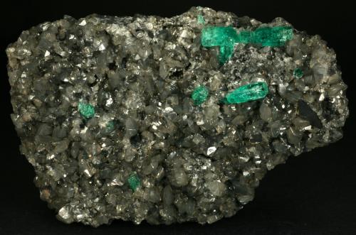 Beryl (variety emerald), Calcite, Pyrite<br />La Pita mining district, Cunas Mine, Municipio Maripí, Western Emerald Belt, Boyacá Department, Colombia<br />105x80x20mm<br /> (Author: Fiebre Verde)