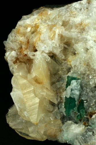 Beryl (variety emerald), Calcite, Quartz<br />Mina Peñas Blancas, Municipio San Pablo de Borbur, Cinturón Esmeraldífero Occidental, Departamento Boyacá, Colombia<br />80x90x35mm<br /> (Author: Fiebre Verde)