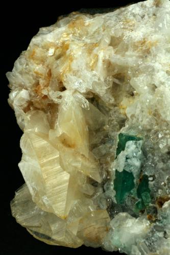 Beryl (variety emerald), Calcite, Quartz<br />Peñas Blancas Mine, Municipio San Pablo de Borbur, Western Emerald Belt, Boyacá Department, Colombia<br />80x90x35mm<br /> (Author: Fiebre Verde)