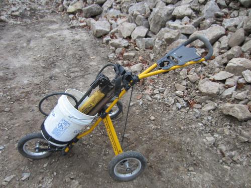 Re-purposed golf cart carrying the pump, ram, and whatever else we can lash on. Very handy. That golf cart never worked so hard. (Author: vic rzonca)