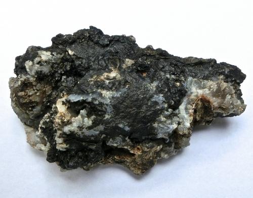 óxidos de manganeso y Cuarzo (variedad calcedonia)<br />Montaña Blanca-Pueblo de Agaete, Agaete, Gran Canaria, Provincia de Las Palmas, Canarias, España<br />7 x 4,5 x 3 cm<br /> (Autor: María Jesús M.)