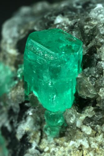 Beryl (variety emerald), Calcite<br />Coscuez mining district, Municipio San Pablo de Borbur, Western Emerald Belt, Boyacá Department, Colombia<br />35x40x55mm<br /> (Author: Fiebre Verde)