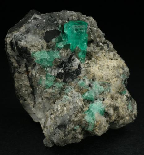 Beryl (variety emerald), Calcite<br />Coscuez mining district, Municipio San Pablo de Borbur, Western Emerald Belt, Boyacá Department, Colombia<br />35x40x55mm<br /> (Author: Fiebre Verde)