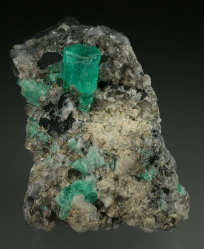 Beryl (variety emerald), Calcite<br />Coscuez mining district, Municipio San Pablo de Borbur, Western Emerald Belt, Boyacá Department, Colombia<br />35x40x55mm<br /> (Author: Fiebre Verde)