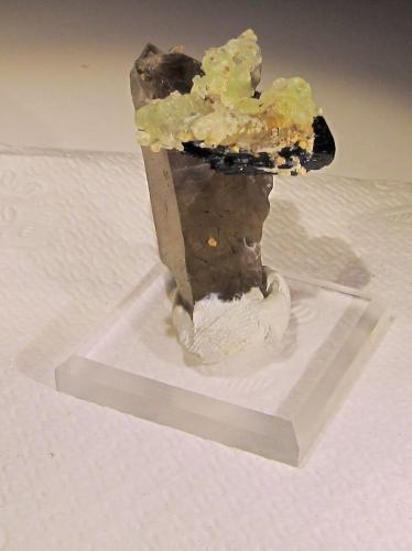Opal (var. hyalite), Schorl (Tourmaline Group), Quartz (var. smokey)<br />Región Erongo, Namibia<br />50mm X 37mm X 37mm<br /> (Author: steven calamuci)