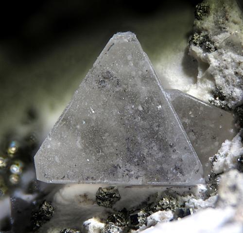 Zunyite<br />Zuni Mine (Zuñi Mine), Anvil Mountain, Red Mountain District, San Juan County, Colorado, USA<br />2.2 mm<br /> (Author: Rewitzer Christian)