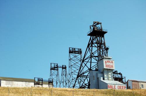 The Mountain Consolidated, or Mt. Con, was the deepest mine at Butte. The main shaft was 5,380 feet deep, and because of its depth, it was a very hot mine to work in. It produced excellent specimens of bornite chalcocite, enargite, and pyrite. (Author: crosstimber)