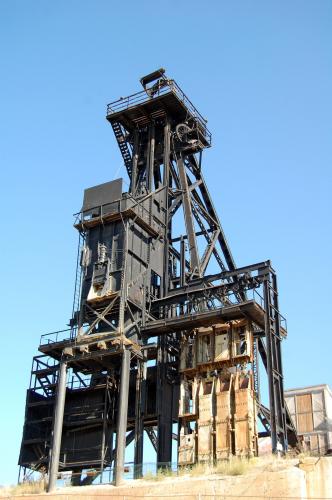 The Steward Mine was staked in 1877 and operated until 1975. A total of 79 men lost their lives in the Steward during it 98 years of operation. The main shaft was 3,900 feet deep and was one of the richest copper/silver mines in the district. It produced fine specimens of barite, bornite, and tennantite. (Author: crosstimber)