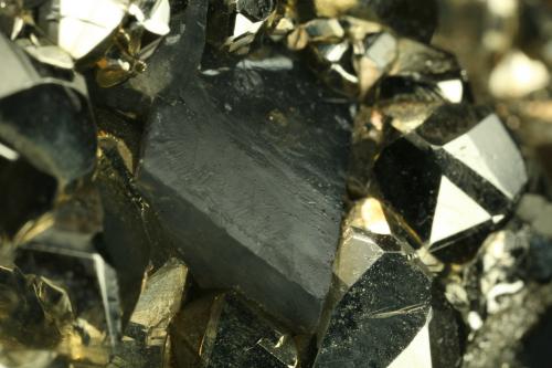 Calcite and Pyrite<br />Chivor mining district, El Acuario Mine, Municipio Chivor, Eastern Emerald Belt, Boyacá Department, Colombia<br />Dolomite rhomb ~1cm<br /> (Author: Fiebre Verde)