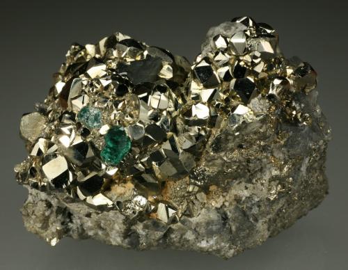 Beryl (variety emerald), Calcite, Pyrite, Dolomite<br />Chivor mining district, El Acuario Mine, Municipio Chivor, Eastern Emerald Belt, Boyacá Department, Colombia<br />60x45x55mm<br /> (Author: Fiebre Verde)