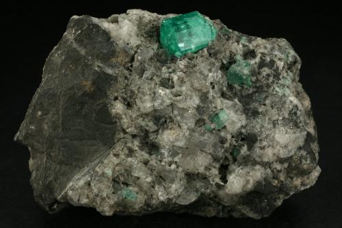 Beryl (variety emerald), Calcite<br />La Pita mining district, Consorcio Mine, Municipio Maripí, Western Emerald Belt, Boyacá Department, Colombia<br />60x80mm<br /> (Author: Fiebre Verde)