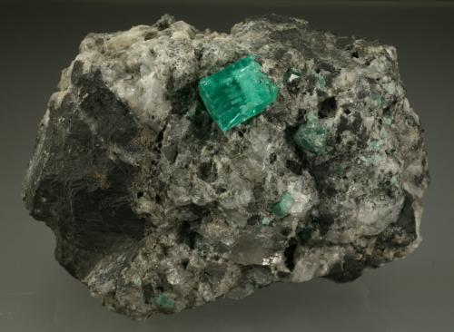 Beryl (variety emerald), Calcite<br />La Pita mining district, Consorcio Mine, Municipio Maripí, Western Emerald Belt, Boyacá Department, Colombia<br />60x80mm<br /> (Author: Fiebre Verde)