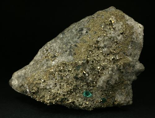 Beryl (variety emerald), Calcite, Pyrite<br />Chivor mining district, El Acuario Mine, Municipio Chivor, Eastern Emerald Belt, Boyacá Department, Colombia<br />105x45x80mm<br /> (Author: Fiebre Verde)