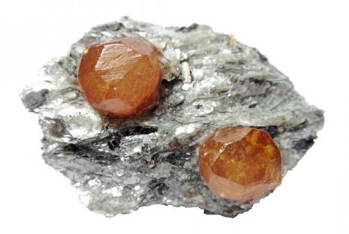 Spessartine<br />Sangulungulu Hill (Nani Hill), Naan village, Loliondo, Ngorongoro District, Arusha Region, Tanzania<br />Specimen size 5 cm, garnet crystal 1 cm<br /> (Author: Tobi)