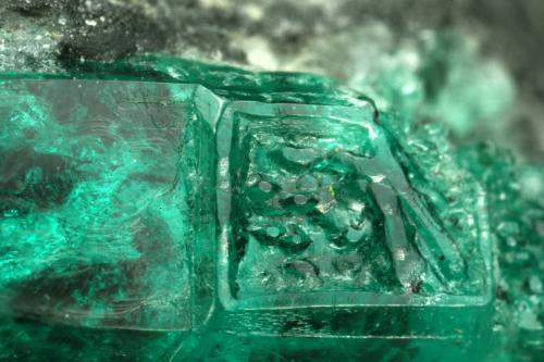 Beryl (variety emerald), Calcite<br />La Pita mining district, Municipio Maripí, Western Emerald Belt, Boyacá Department, Colombia<br />40mm across, xl=15mm<br /> (Author: Fiebre Verde)