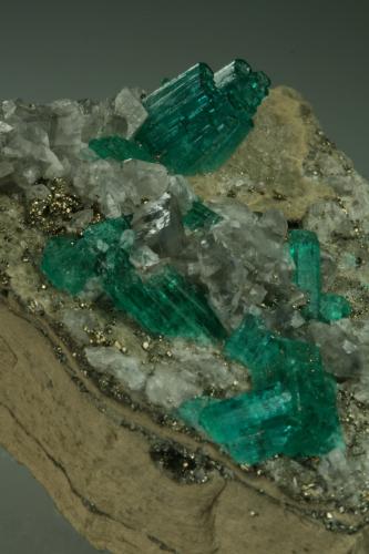 Beryl (variety emerald), Calcite, Pyrite<br />Chivor mining district, Municipio Chivor, Eastern Emerald Belt, Boyacá Department, Colombia<br />42x48x20mm - Detail<br /> (Author: Fiebre Verde)