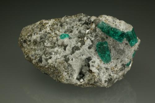 Beryl (variety emerald), Calcite, Pyrite<br />Chivor mining district, Municipio Chivor, Eastern Emerald Belt, Boyacá Department, Colombia<br />55x35x28mm<br /> (Author: Fiebre Verde)