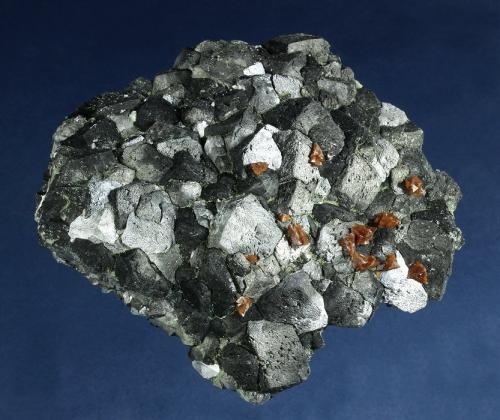 Genthelvite on Magnetite<br />Huanggang Mines, Hexigten Banner (Kèshíkèténg Qí), Chifeng (Ulanhad), Inner Mongolia Autonomous Region, China<br />108 x 97 x 30 mm<br /> (Author: GneissWare)