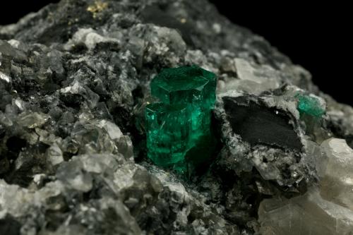 Beryl (variety emerald), Calcite, Pyrite<br />La Pita mining district, Municipio Maripí, Western Emerald Belt, Boyacá Department, Colombia<br />xl=11mm<br /> (Author: Fiebre Verde)