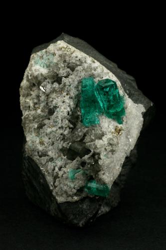 Beryl (variety emerald), Calcite, Pyrite<br />Chivor mining district, El Oriente Mine, Municipio Chivor, Eastern Emerald Belt, Boyacá Department, Colombia<br />55x35x32mm<br /> (Author: Fiebre Verde)