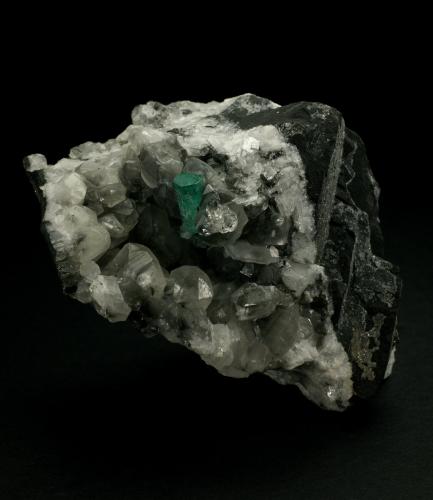 Beryl (variety emerald), Calcite, Quartz<br />La Pita mining district, Municipio Maripí, Western Emerald Belt, Boyacá Department, Colombia<br />60x45x52mm<br /> (Author: Fiebre Verde)