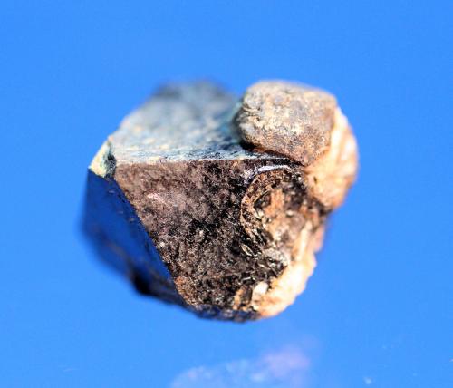 Baddeleyite ps after Kimzeyite on Perovskite<br />Perovskite Hill, Magnet Cove, Hot Spring County, Arkansas, USA<br />1.5 x 1.4 cm<br /> (Author: Don Lum)