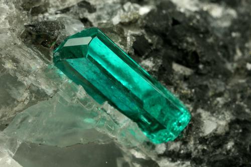 Beryl (variety emerald), Calcite, Pyrite<br />Coscuez mining district, Municipio San Pablo de Borbur, Western Emerald Belt, Boyacá Department, Colombia<br />43x38x50mm,  xl=11mm<br /> (Author: Fiebre Verde)