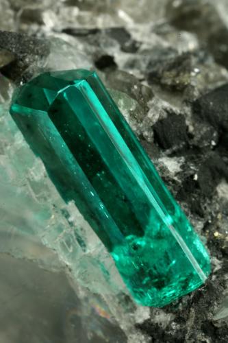 Beryl (variety emerald), Calcite, Pyrite<br />Coscuez mining district, Municipio San Pablo de Borbur, Western Emerald Belt, Boyacá Department, Colombia<br />43x38x50mm,  xl=11mm<br /> (Author: Fiebre Verde)