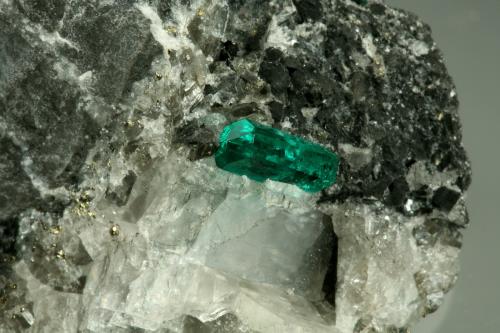 Beryl (variety emerald), Calcite, Pyrite<br />Coscuez mining district, Municipio San Pablo de Borbur, Western Emerald Belt, Boyacá Department, Colombia<br />43x38x50mm,  xl=11mm<br /> (Author: Fiebre Verde)