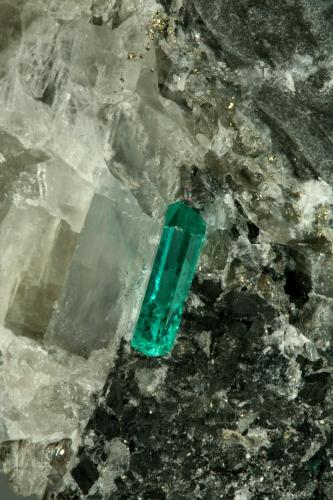 Beryl (variety emerald), Calcite, Pyrite<br />Coscuez mining district, Municipio San Pablo de Borbur, Western Emerald Belt, Boyacá Department, Colombia<br />43x38x50mm,  xl=11mm<br /> (Author: Fiebre Verde)