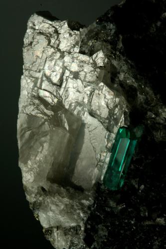 Beryl (variety emerald), Calcite, Pyrite<br />Coscuez mining district, Municipio San Pablo de Borbur, Western Emerald Belt, Boyacá Department, Colombia<br />43x38x50mm,  xl=11mm<br /> (Author: Fiebre Verde)